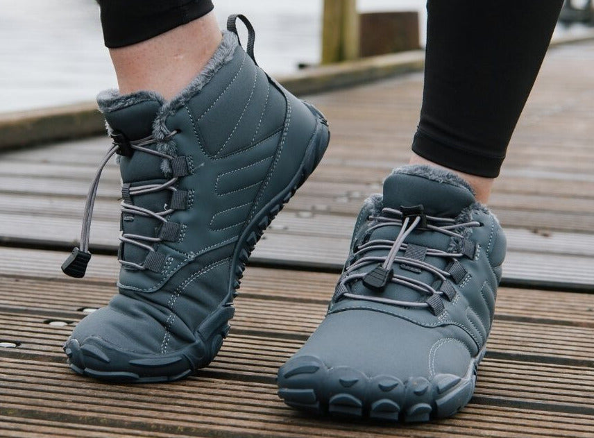 "ArcticBare Flex winter barefoot schoenen, antislip, waterdicht, uniseks, outdoor, zwart met rubberen zolen."
