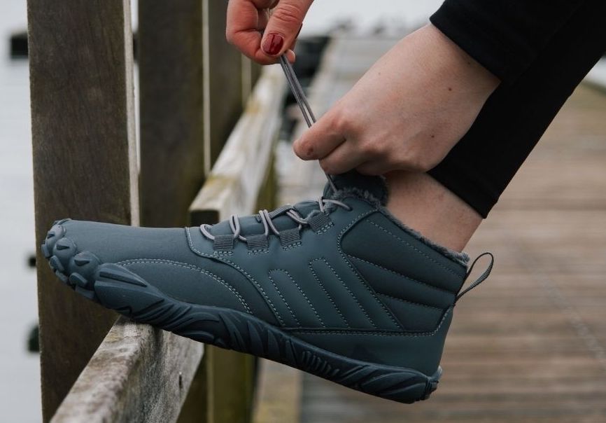 "ArcticBare Flex winter barefoot schoenen, antislip, waterdicht, uniseks, outdoor, zwart met rubberen zolen."