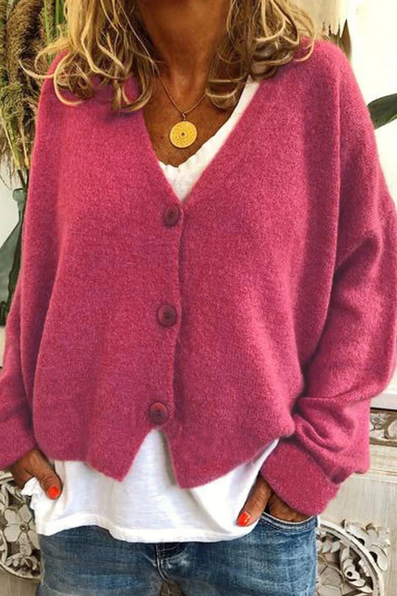 "Aspen vest voor dames met V-hals, gebreid patchwork, levendige kleuren en knusse textuur, stijlvol en comfortabel."