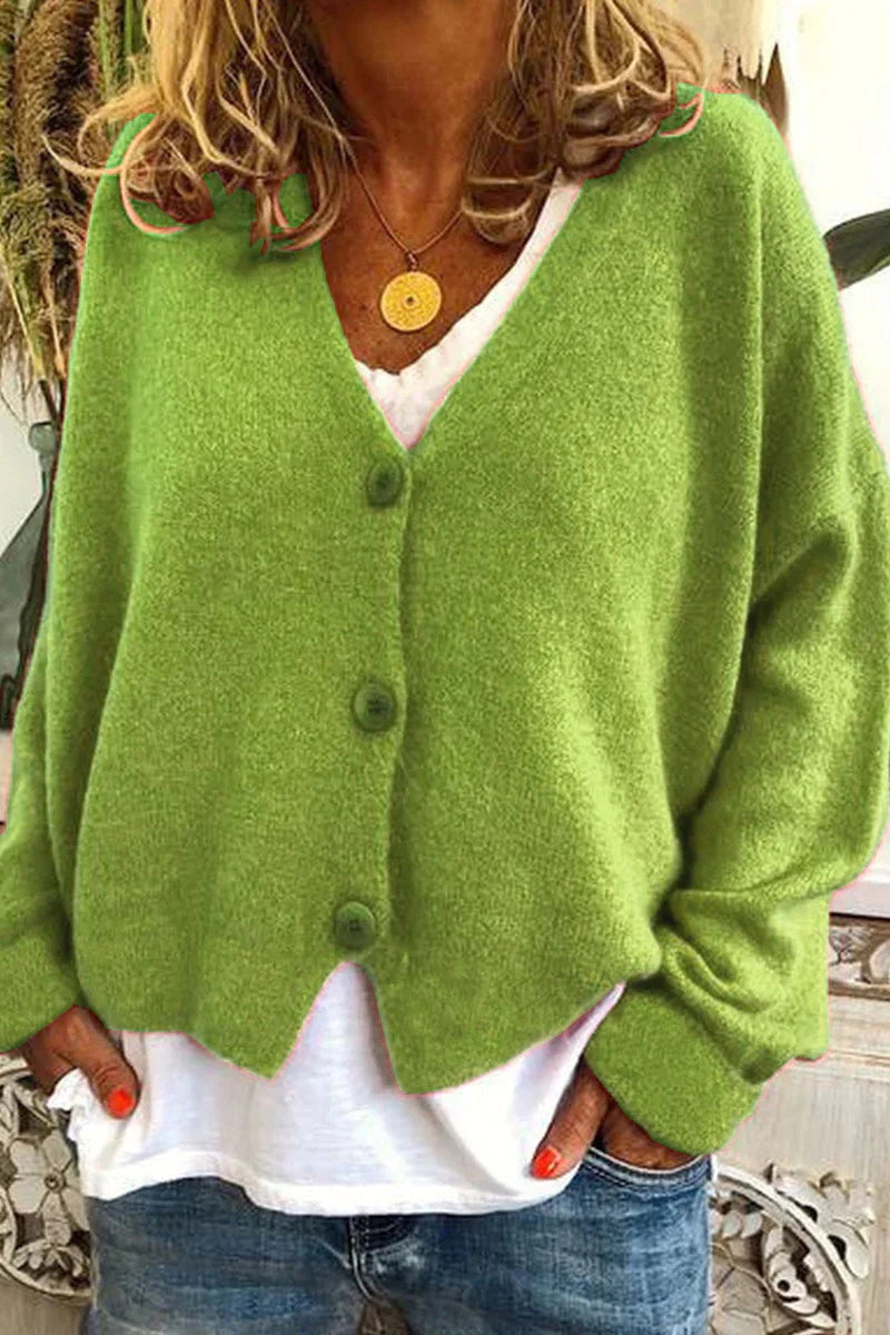 "Aspen vest voor dames met V-hals, gebreid patchwork, levendige kleuren en knusse textuur, stijlvol en comfortabel."