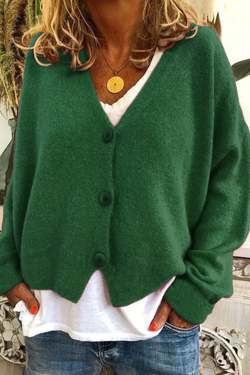 "Aspen vest voor dames met V-hals, gebreid patchwork, levendige kleuren en knusse textuur, stijlvol en comfortabel."