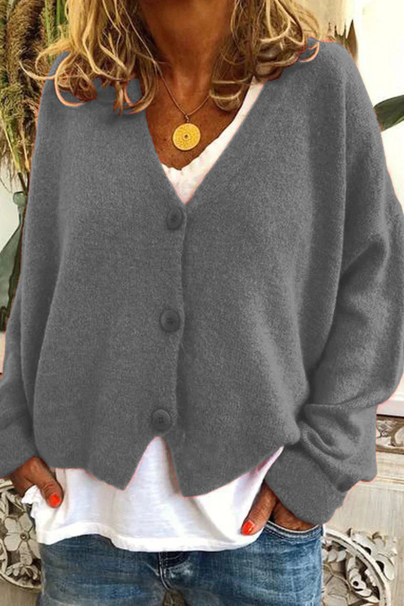 "Aspen vest voor dames met V-hals, gebreid patchwork, levendige kleuren en knusse textuur, stijlvol en comfortabel."