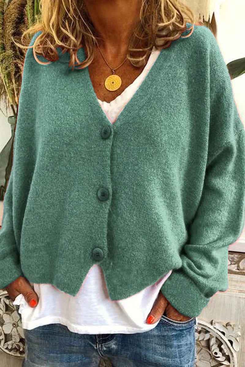 "Aspen vest voor dames met V-hals, gebreid patchwork, levendige kleuren en knusse textuur, stijlvol en comfortabel."