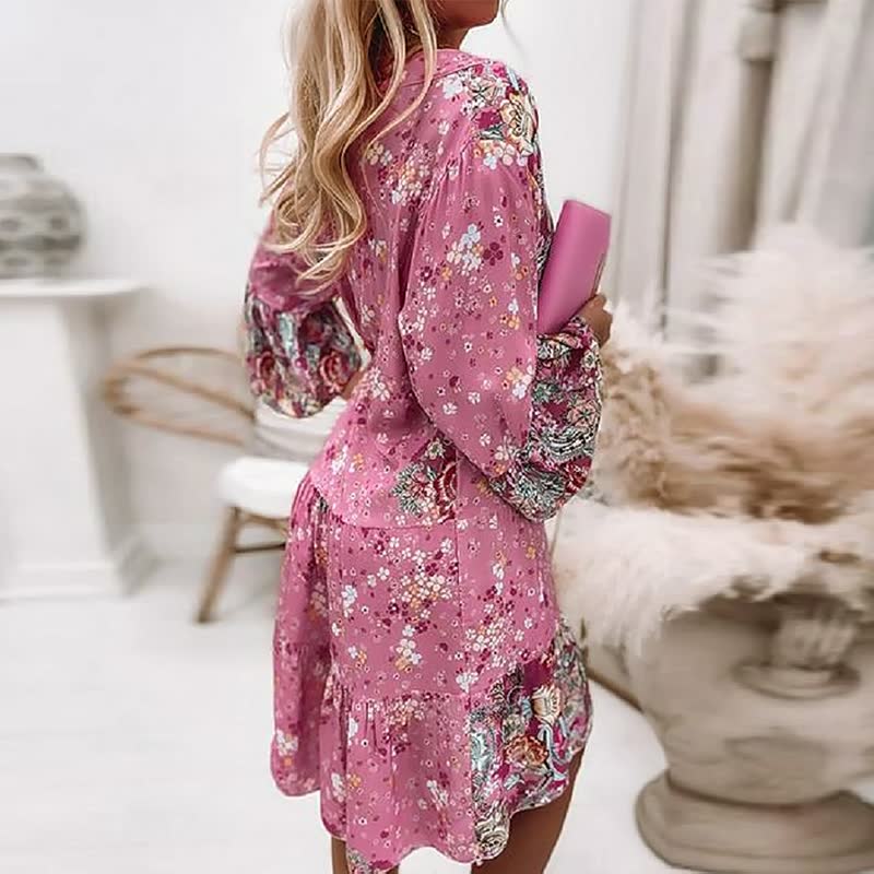 Boho zomerjurk dames met kleurrijke print, V-hals, flairmouwen en midi lengte, ideaal voor zomerse gelegenheden.