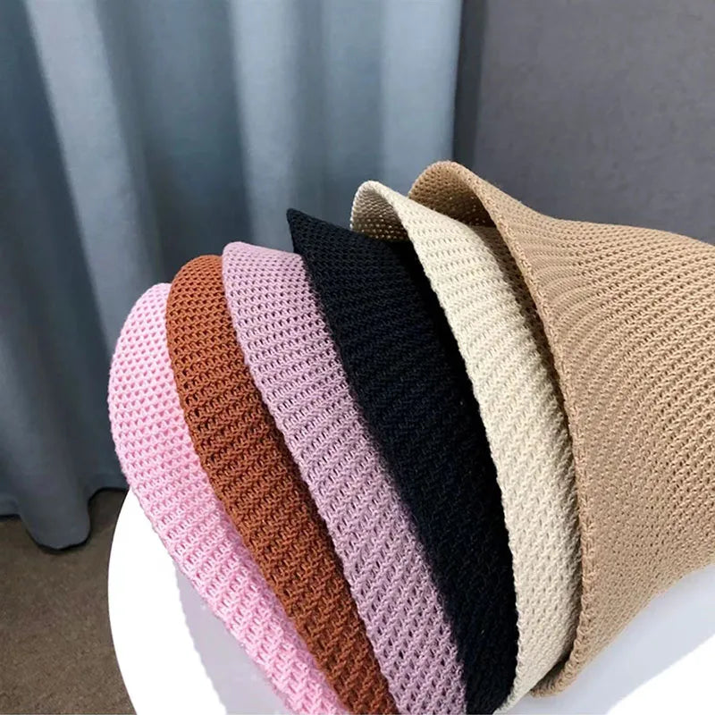 "Dahlia Zonnehoed, brede rand, ademend en opvouwbaar, elegante damesaccessoire voor ultieme zomerbescherming."