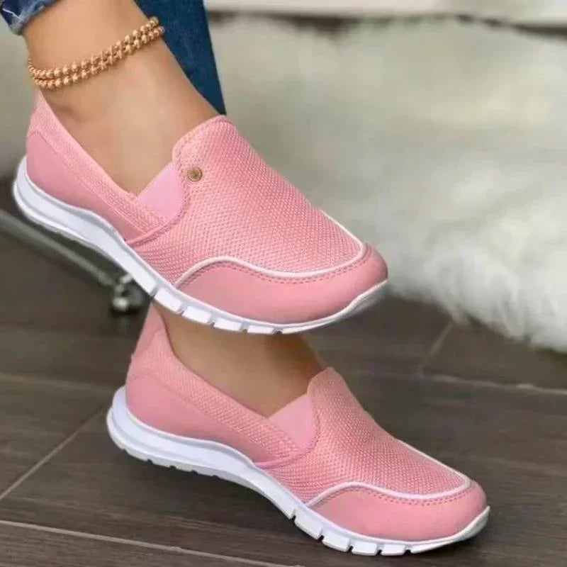 "Dames slip-on orthopedische diabetesschoenen in elegant roze, met ademend textiel en antislip zool voor optimaal comfort."
