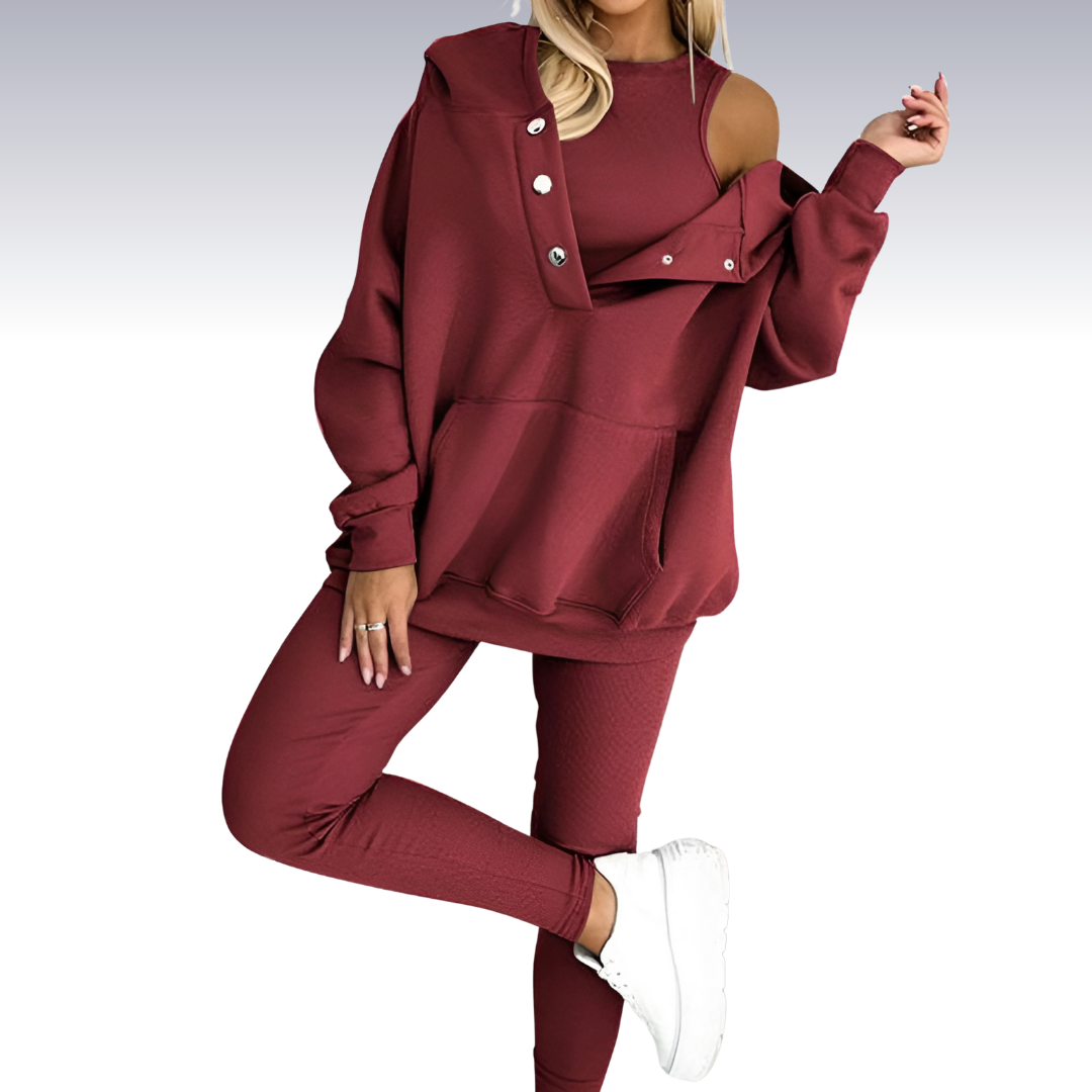 "Driedelige sportset dames met elegante top, sportbeha en legging; ademende en elastische stoffen voor comfort en stijl."