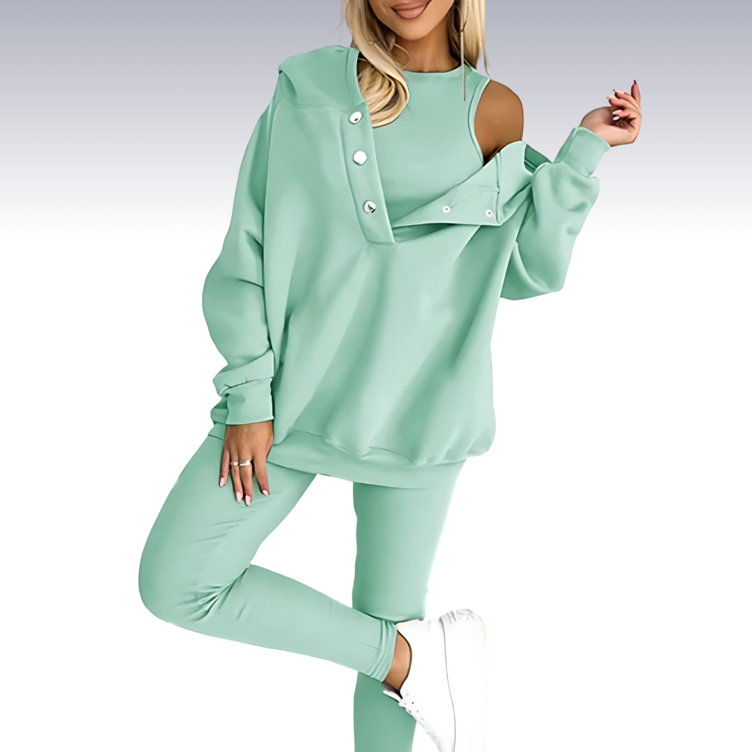 "Driedelige sportset dames met elegante top, sportbeha en legging; ademende en elastische stoffen voor comfort en stijl."