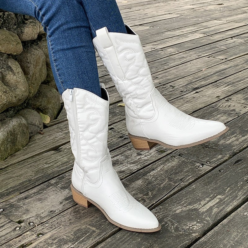 "Elegante dames cowboylaarzen met sprankelende metallic afwerking, hoge hak en moderne uitstraling voor een glamoureuze look.