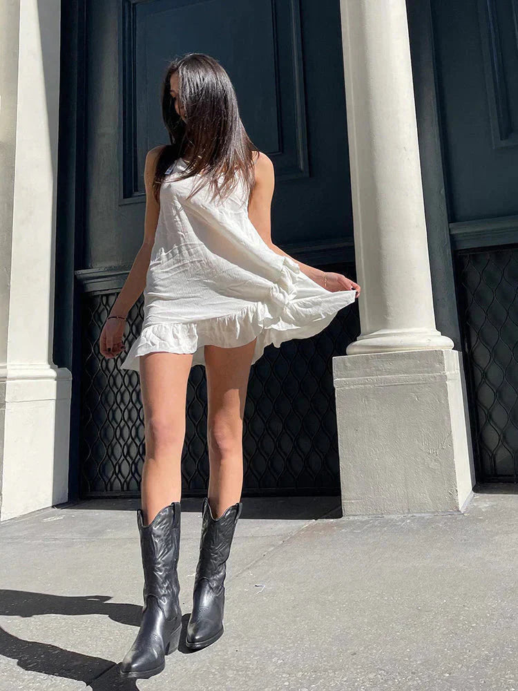 "Elegante dames cowboylaarzen met sprankelende metallic afwerking, hoge hak en moderne uitstraling voor een glamoureuze look.