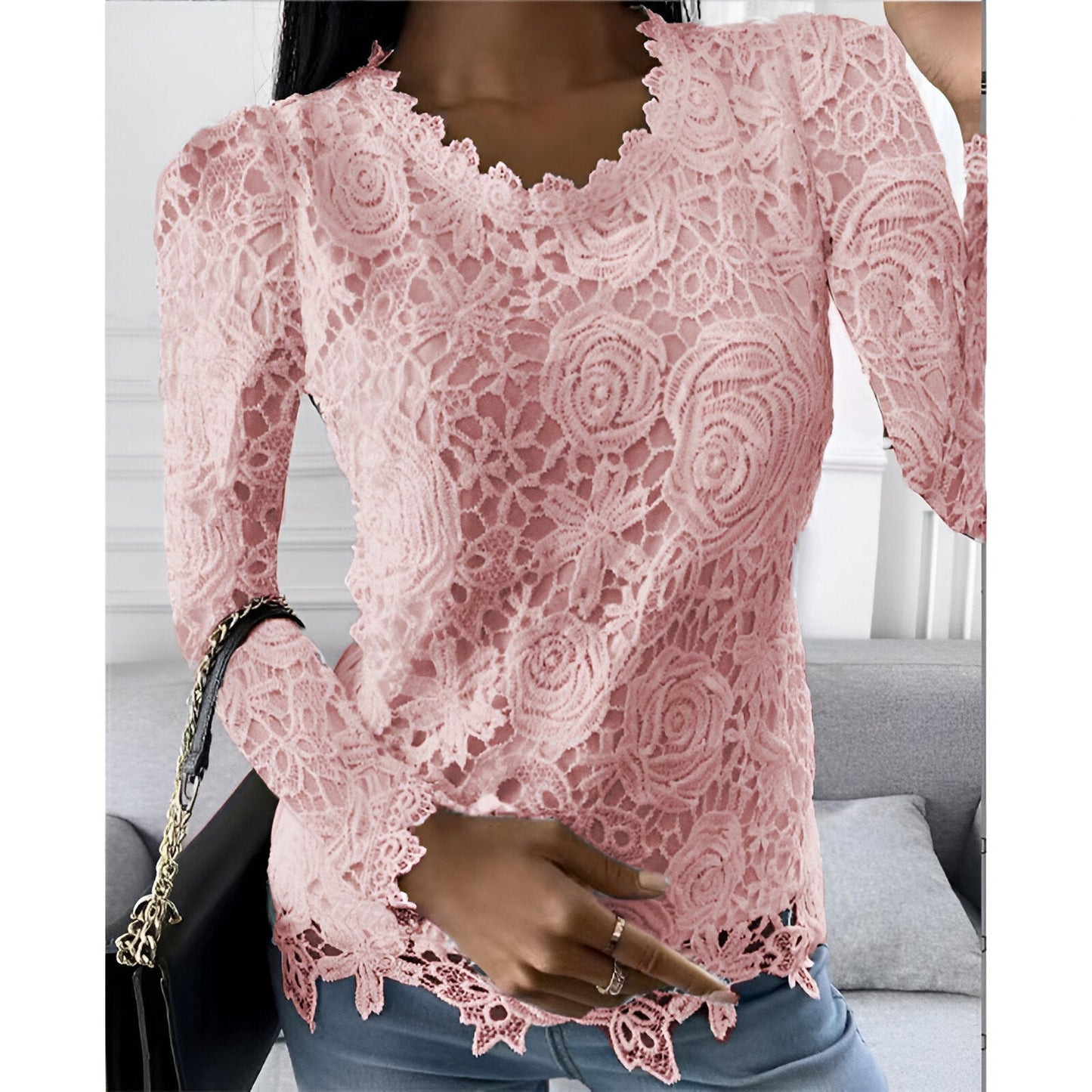 "Elegante kanten blouse met lange mouwen, vrouwelijke uitstraling, klassieke ronde hals, ideaal voor elke gelegenheid."