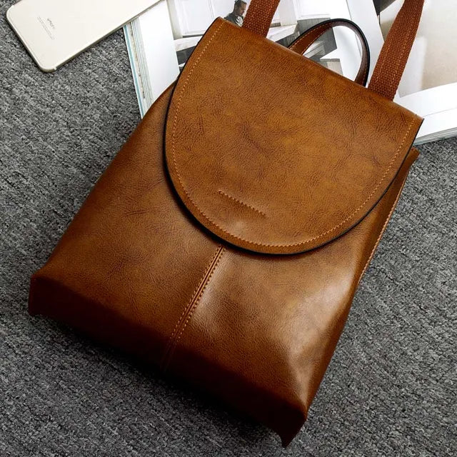 "Elegante leren rugzak met veelzijdige opbergruimte, hoogwaardig leer, tijdloos ontwerp, ideaal voor modebewuste vrouwen."
