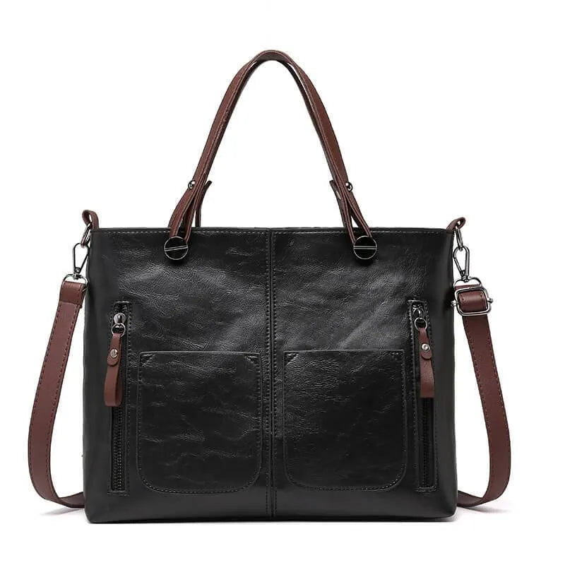 "Elegante leren schoudertas met magnetische sluiting, duurzaam bruin leer, verstelbare riem voor draagcomfort."