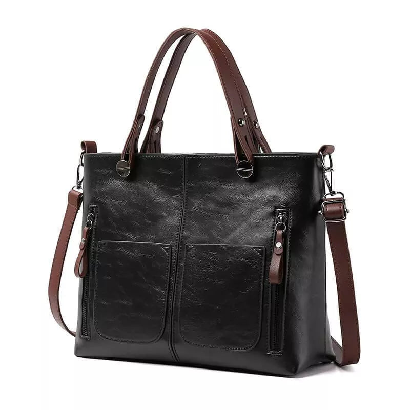 "Elegante leren schoudertas met magnetische sluiting, duurzaam bruin leer, verstelbare riem voor draagcomfort."