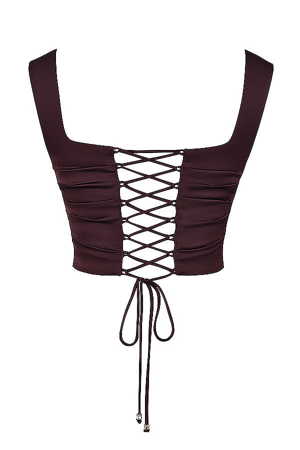 "Elegante satijnen Odette set met corset-top en maxirok, luxe diepe tinten voor stijlvolle vrouwelijke uitstraling."