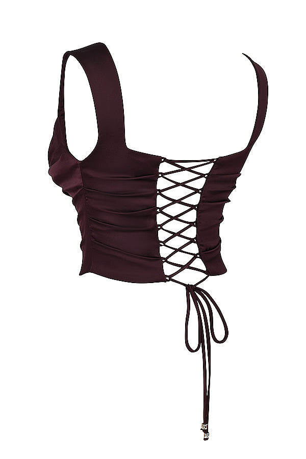 "Elegante satijnen Odette set met corset-top en maxirok, luxe diepe tinten voor stijlvolle vrouwelijke uitstraling."