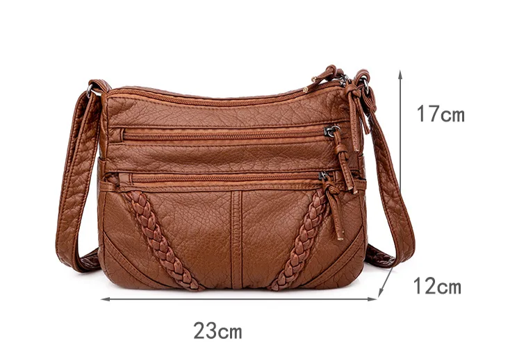 "Elegante schoudertas van hoogwaardig Zwitsers leer, tijdloze stijl, verstelbare riem, praktisch ontwerp, damesaccessoire."