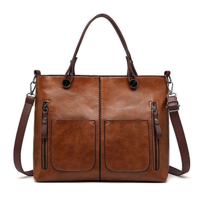 "Elegante vintage leren schoudertas voor dames met verfijnde stiksels en ruime opbergvakken, ideaal voor dagelijks gebruik."