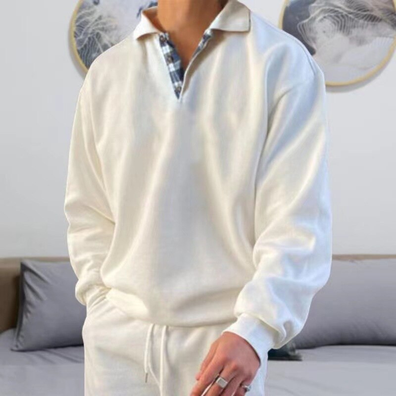"Heren pullover met klassieke pasvorm in zwart, grijs, blauw en groen. Perfect voor casual en zakelijke outfits."