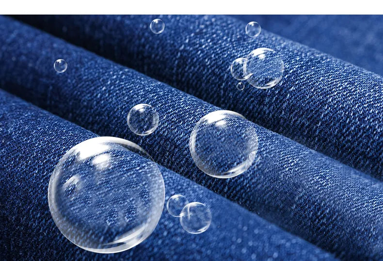 "Heren stretch jeans, slim fit, donkerblauw, nauwsluitend design, elegant en comfortabel voor elke gelegenheid."