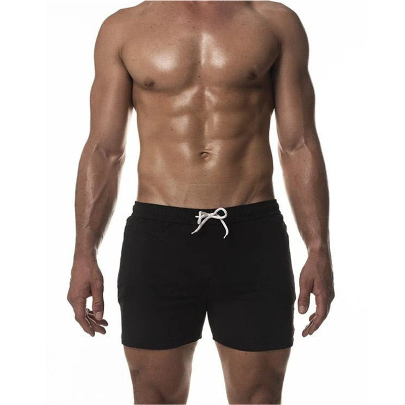 "Heren trainingszwemshort, sneldrogend en sportief ontwerp, elastische tailleband, ademende stof, zijzakken."