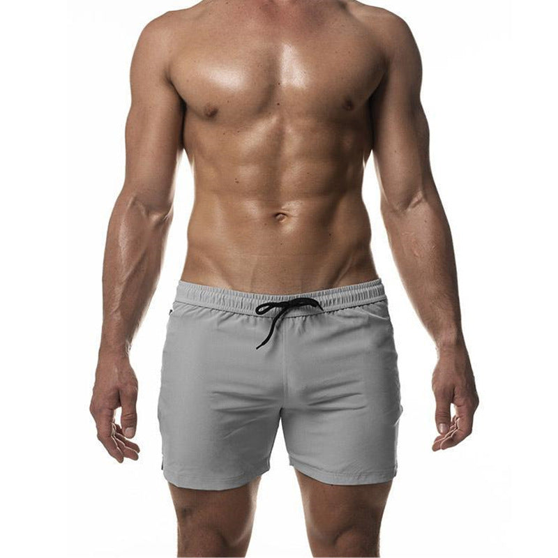 "Heren trainingszwemshort, sneldrogend en sportief ontwerp, elastische tailleband, ademende stof, zijzakken."