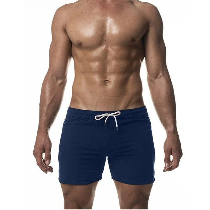 "Heren trainingszwemshort, sneldrogend en sportief ontwerp, elastische tailleband, ademende stof, zijzakken."