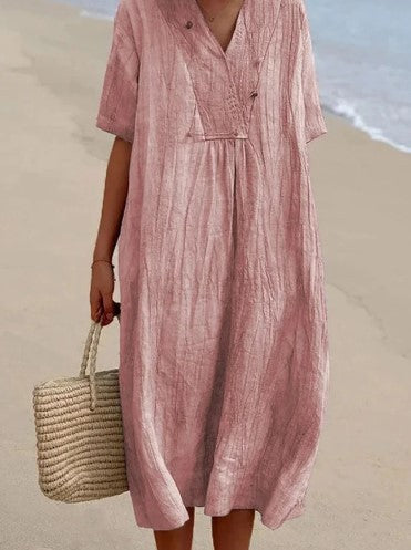 "Jasmin midi jurk van katoen-linnen, V-hals met korte mouwen, flatterende pasvorm en elegante zomerstijl voor dames."