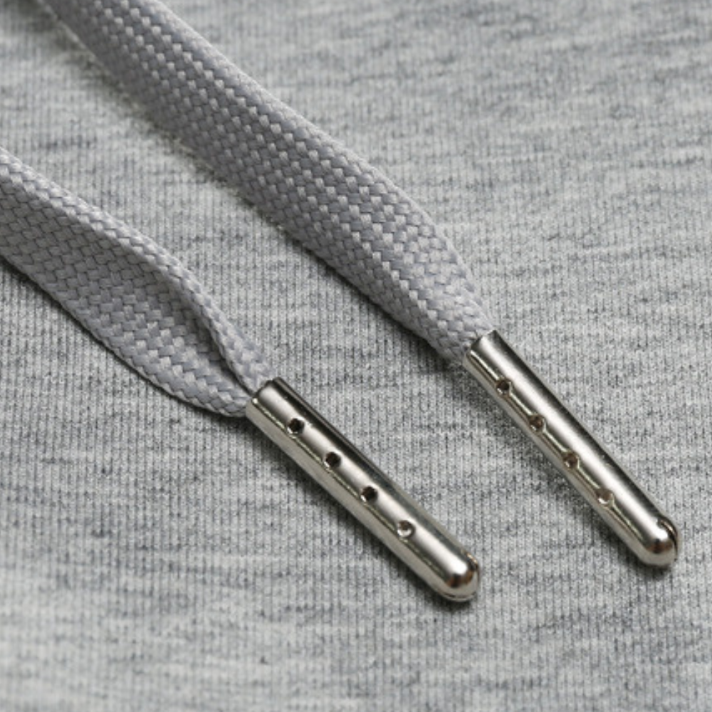 "Lichte heren joggingbroek, katoen, comfortabele pasvorm, elastische taille, moderne wijde pijpen, minimalistische stijl."