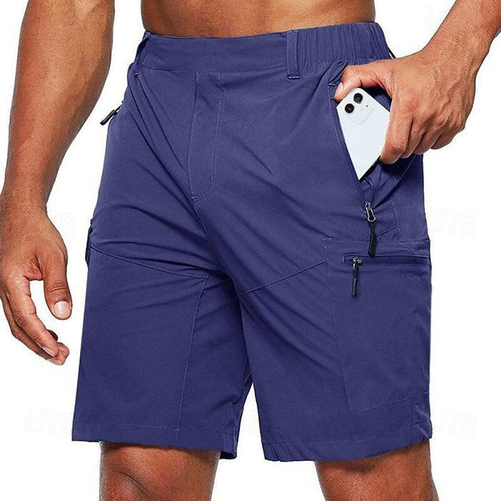 "Lichtgewicht ademende zomerbroek heren, donkerblauw, elastische tailleband, perfect voor casual en outdoor activiteiten."