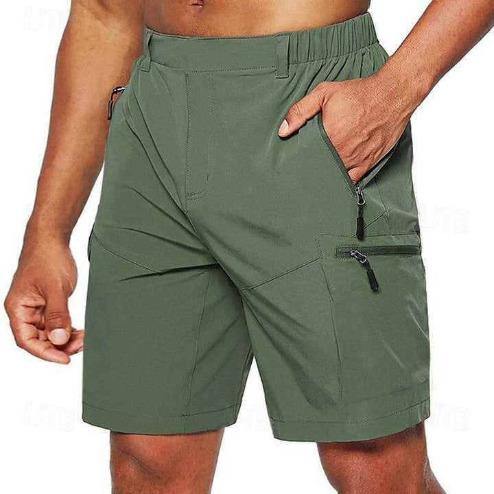 "Lichtgewicht ademende zomerbroek heren, donkerblauw, elastische tailleband, perfect voor casual en outdoor activiteiten."