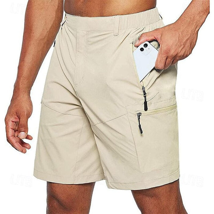 "Lichtgewicht ademende zomerbroek heren, donkerblauw, elastische tailleband, perfect voor casual en outdoor activiteiten."