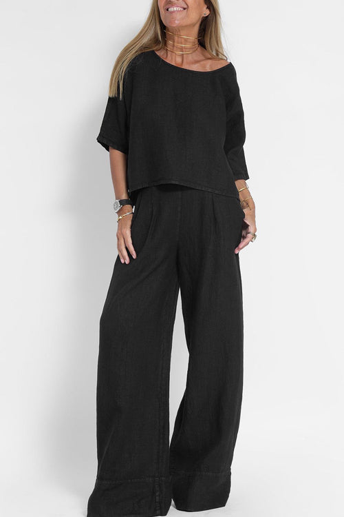 Luchtig katoen-linnen pak voor dames met een cropped shirt en wijde broek, perfect voor een stijlvolle zomerse look.