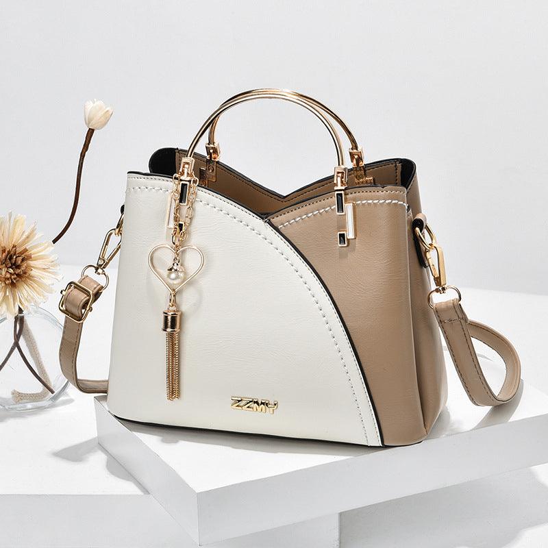 Luxe dames tote tas in leer met elegante lijnen, verkrijgbaar in trendy kleuren, perfect voor stijlvolle en moderne looks.