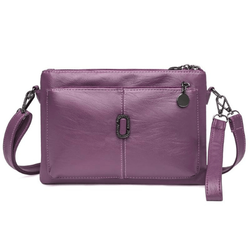 Luxe leren schoudertas voor dames, elegant design met ruime compartimenten en hoogwaardige afwerking, in diverse kleuren.