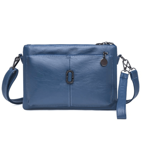 Luxe leren schoudertas voor dames, elegant design met ruime compartimenten en hoogwaardige afwerking, in diverse kleuren.