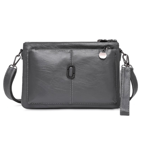 Luxe leren schoudertas voor dames, elegant design met ruime compartimenten en hoogwaardige afwerking, in diverse kleuren.