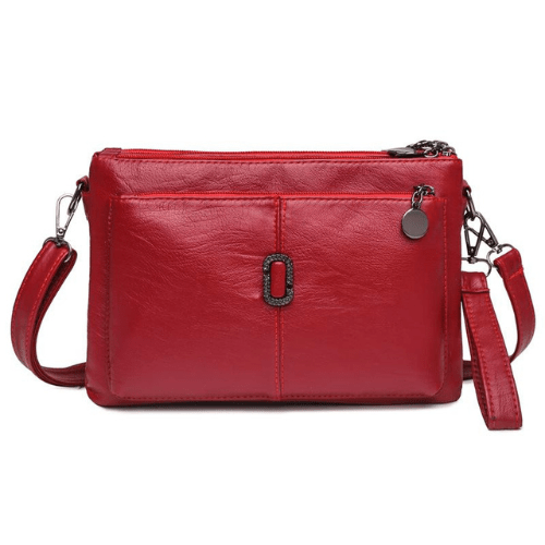 Luxe leren schoudertas voor dames, elegant design met ruime compartimenten en hoogwaardige afwerking, in diverse kleuren.