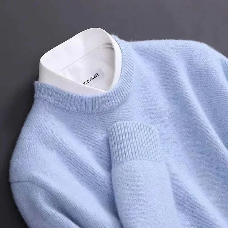 "Luxueuze kasjmier herentrui, elegante snit, blauw en camel, voor stijl en warmte. Ideaal voor casual en formele gelegenheden