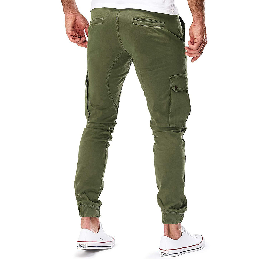 "Moderne heren cargo broek met elastische taille, ruime zakken en trendy ontwerp voor comfort en stijl."