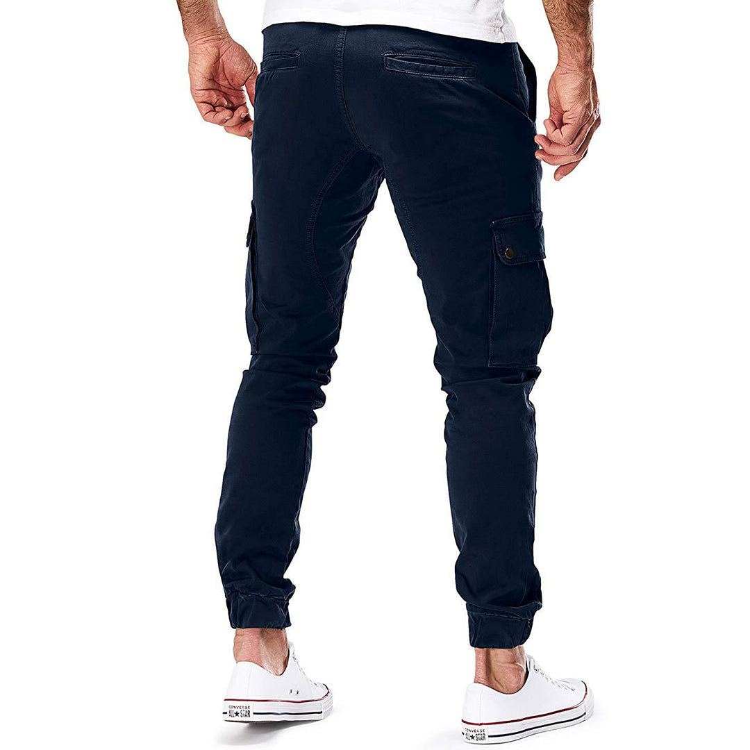 "Moderne heren cargo broek met elastische taille, ruime zakken en trendy ontwerp voor comfort en stijl."
