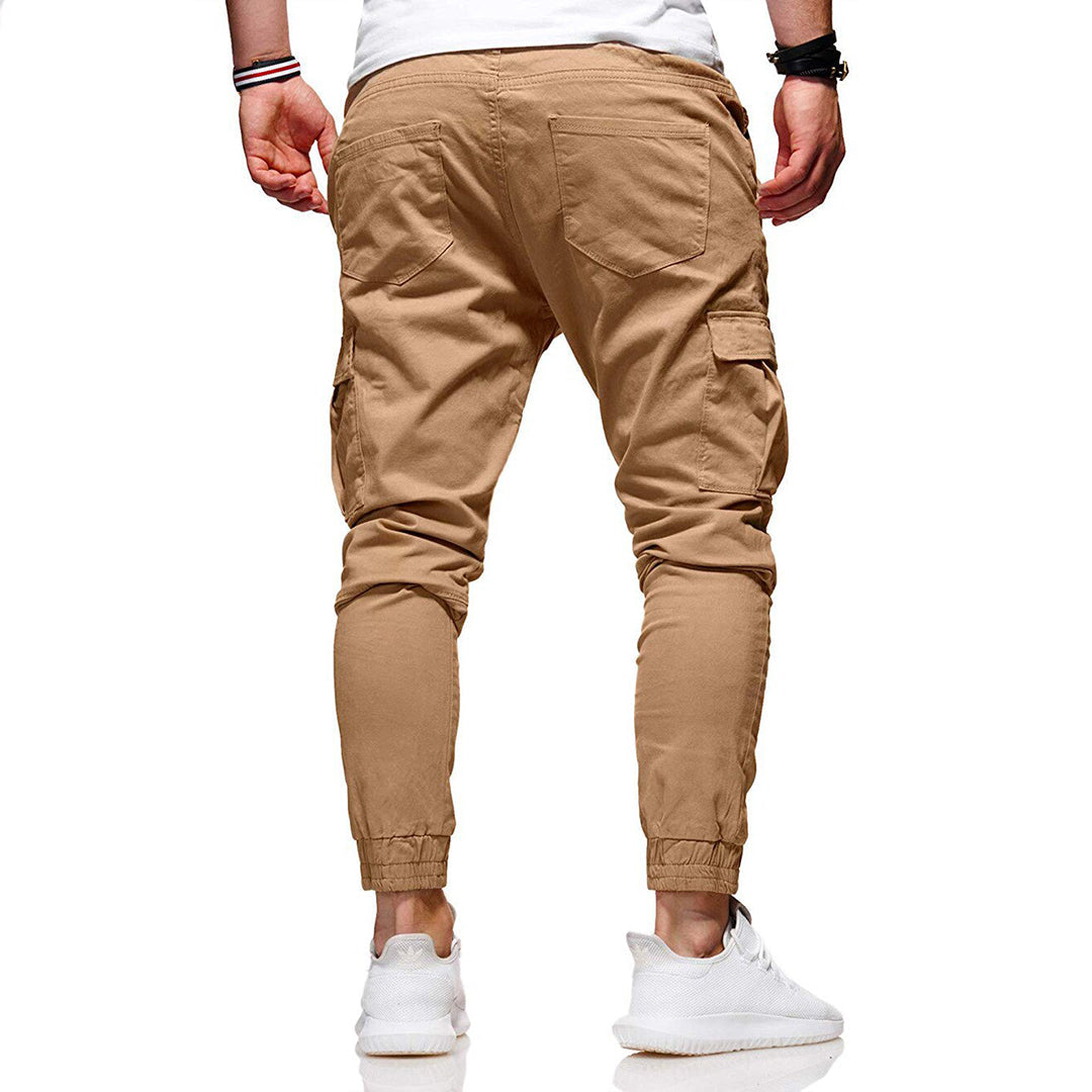 "Moderne heren cargo broek met elastische taille, ruime zakken en trendy ontwerp voor comfort en stijl."