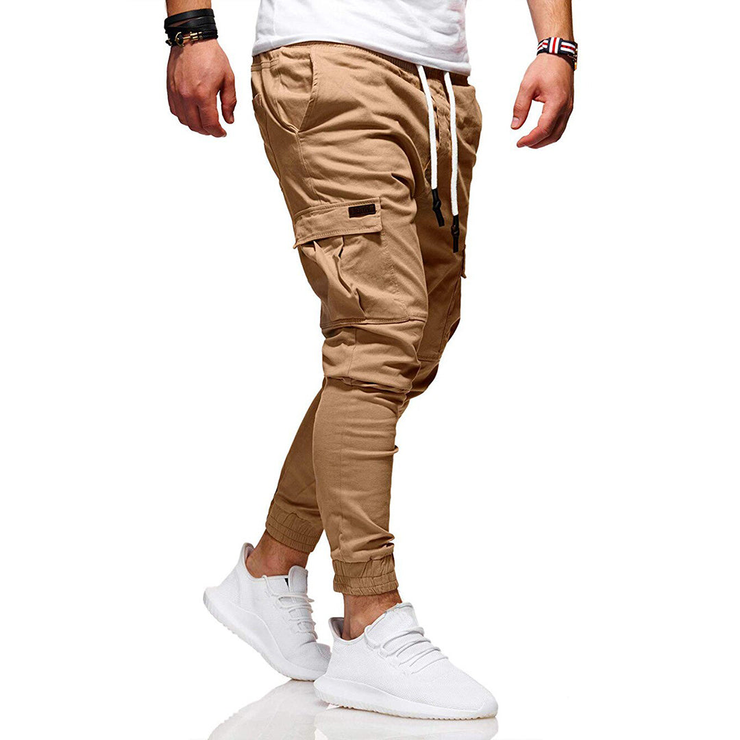 "Moderne heren cargo broek met elastische taille, ruime zakken en trendy ontwerp voor comfort en stijl."