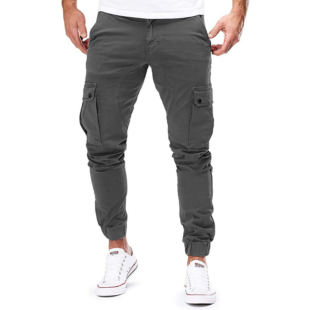 "Moderne heren cargo broek met elastische taille, ruime zakken en trendy ontwerp voor comfort en stijl."
