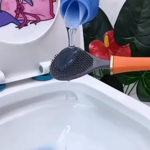 "Moderne toiletborstel CleanGuard met borstelharen in groen, oranje, wit voor hygiënische badkamerreiniging."