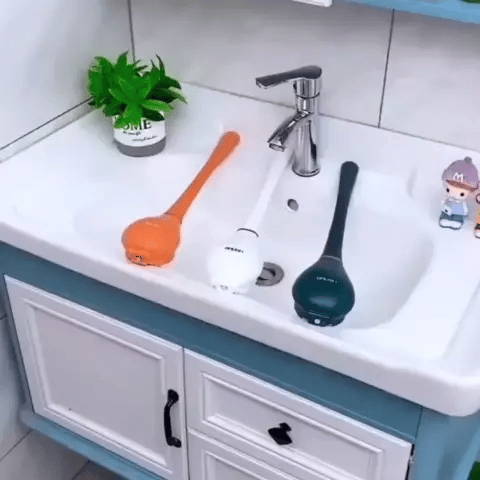 "Moderne toiletborstel CleanGuard met borstelharen in groen, oranje, wit voor hygiënische badkamerreiniging."