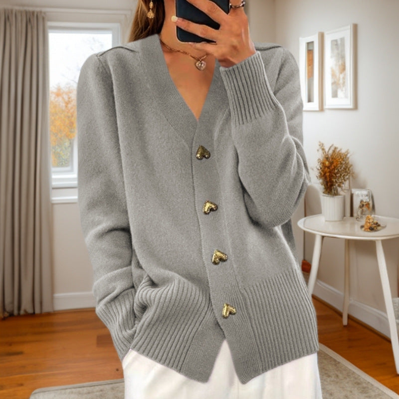 Mouwloos gebreid vest voor dames in beige en grijs, stijlvol en comfortabel met zakken, perfect voor elk seizoen.