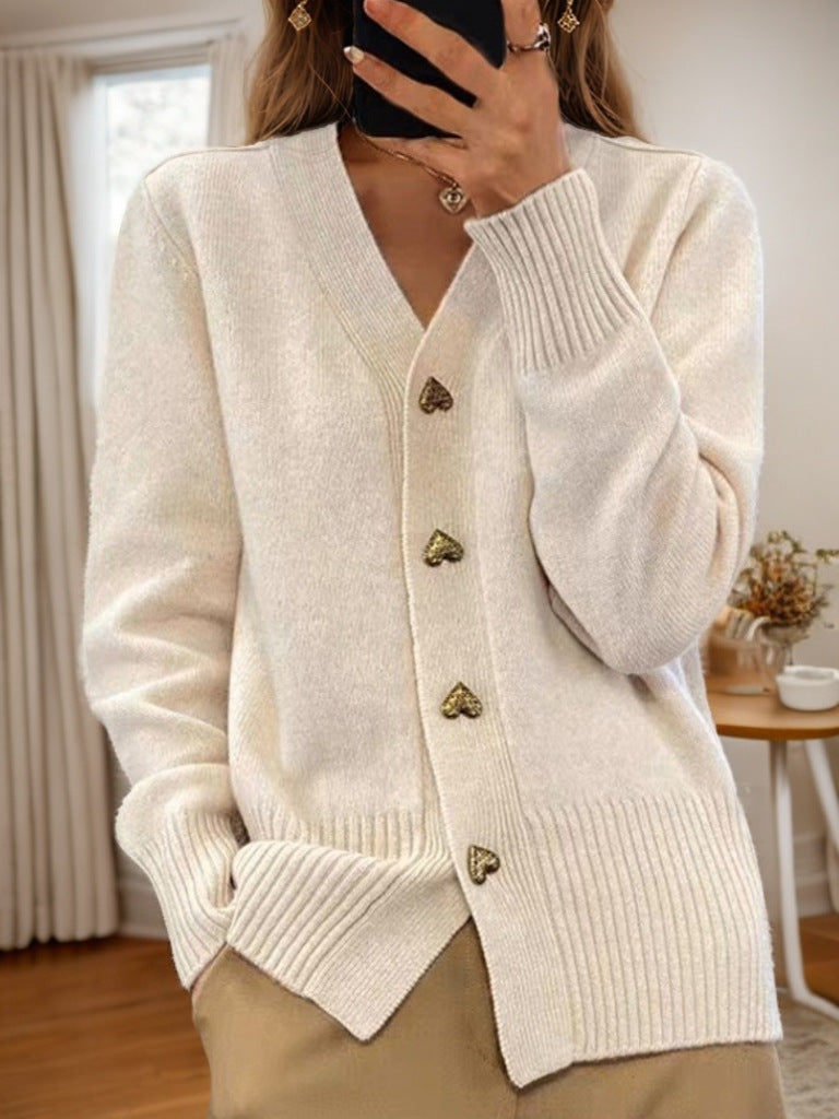 Mouwloos gebreid vest voor dames in beige en grijs, stijlvol en comfortabel met zakken, perfect voor elk seizoen.