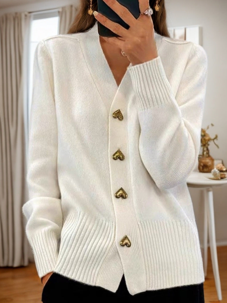 Mouwloos gebreid vest voor dames in beige en grijs, stijlvol en comfortabel met zakken, perfect voor elk seizoen.