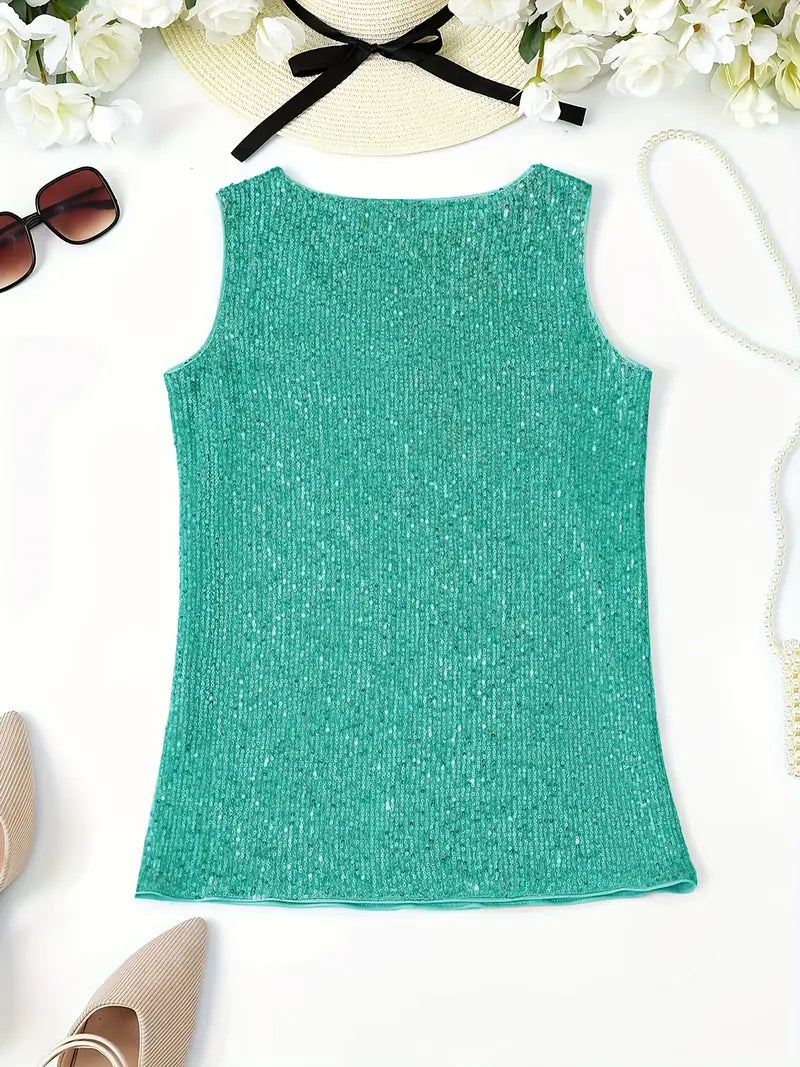 "Mouwloze top met V-hals, pailletten, elegante uitstraling, lichte stof; perfect voor zomer en avondjes uit."